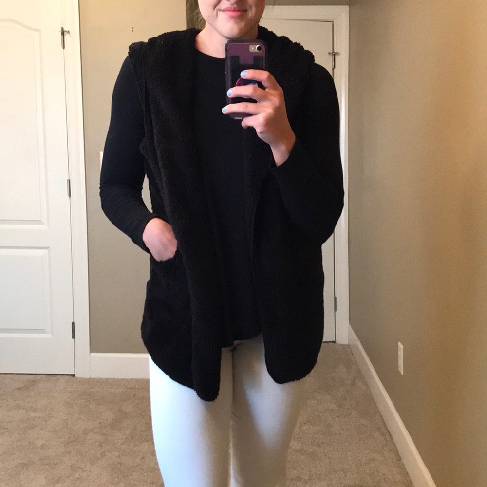 Hooded black fuzzy vest. Size medium. NWOT